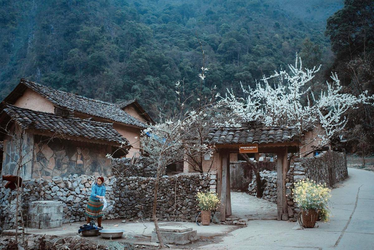 Surrounding Dong Van ancient town are rolling mountains and lush green vegetation.