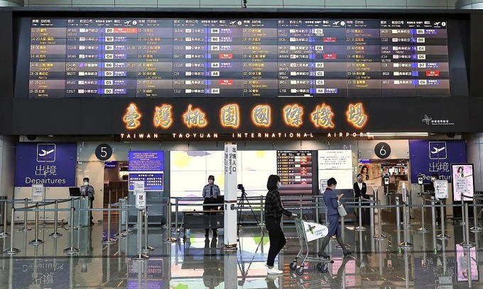 People at Taoyuan International Airport in Taiwan. Photo by Reuters