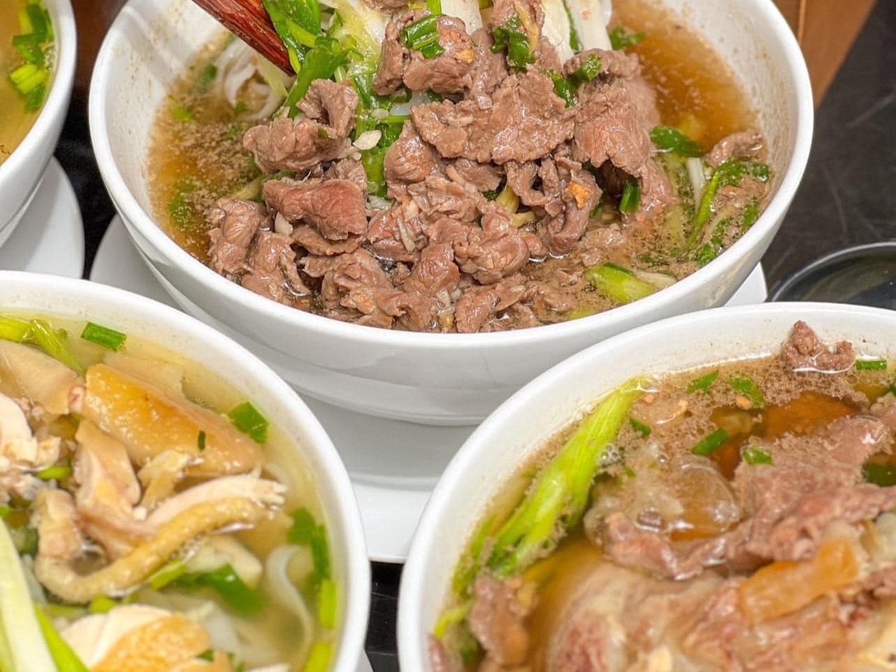 The condiments served with Saigon pho and Hanoi pho are different