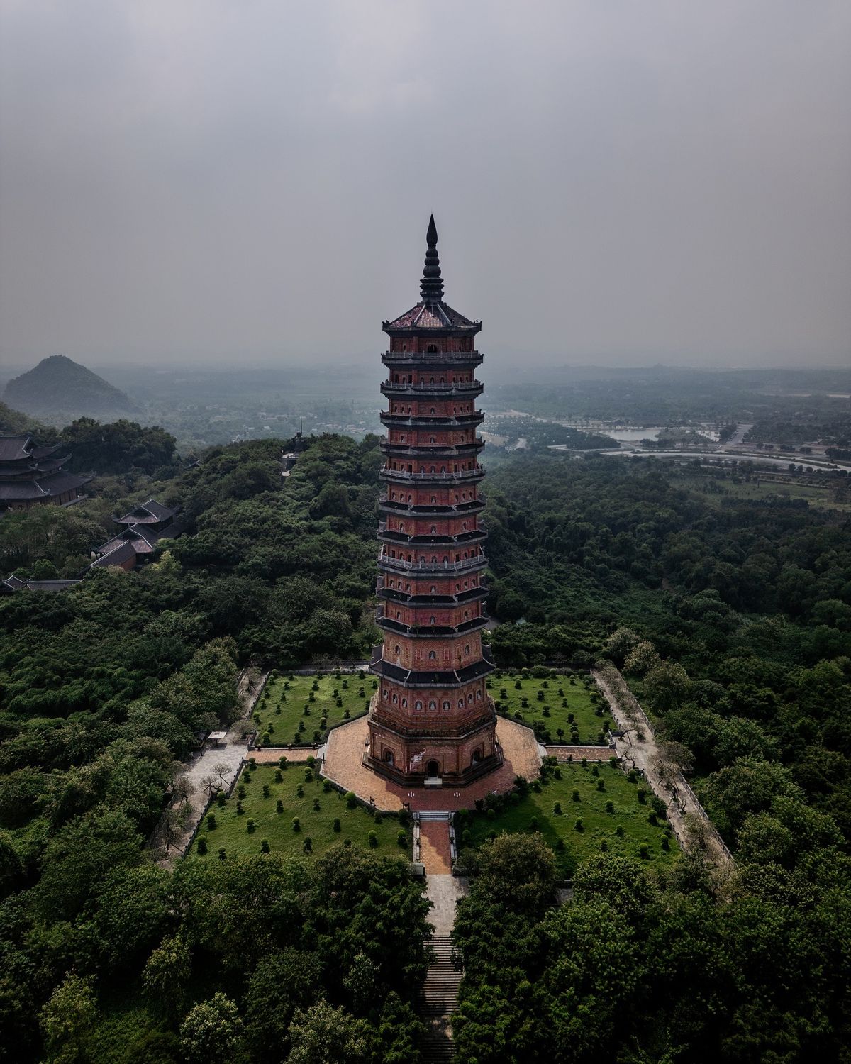 The majestic and magnificent Bai Dinh Pagoda amid Ninh Binh’s natural landscape.