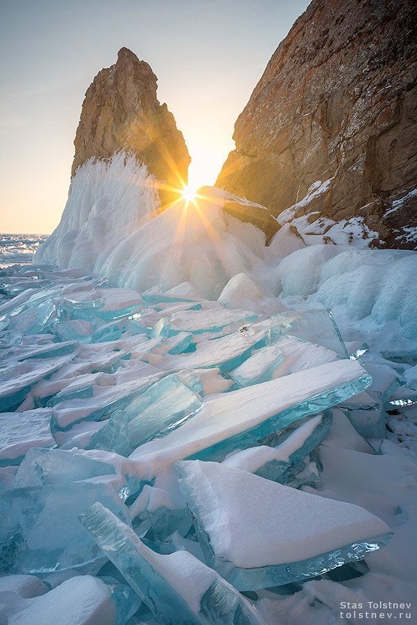 Layers of ice stack together, forming streaks of deep blue light